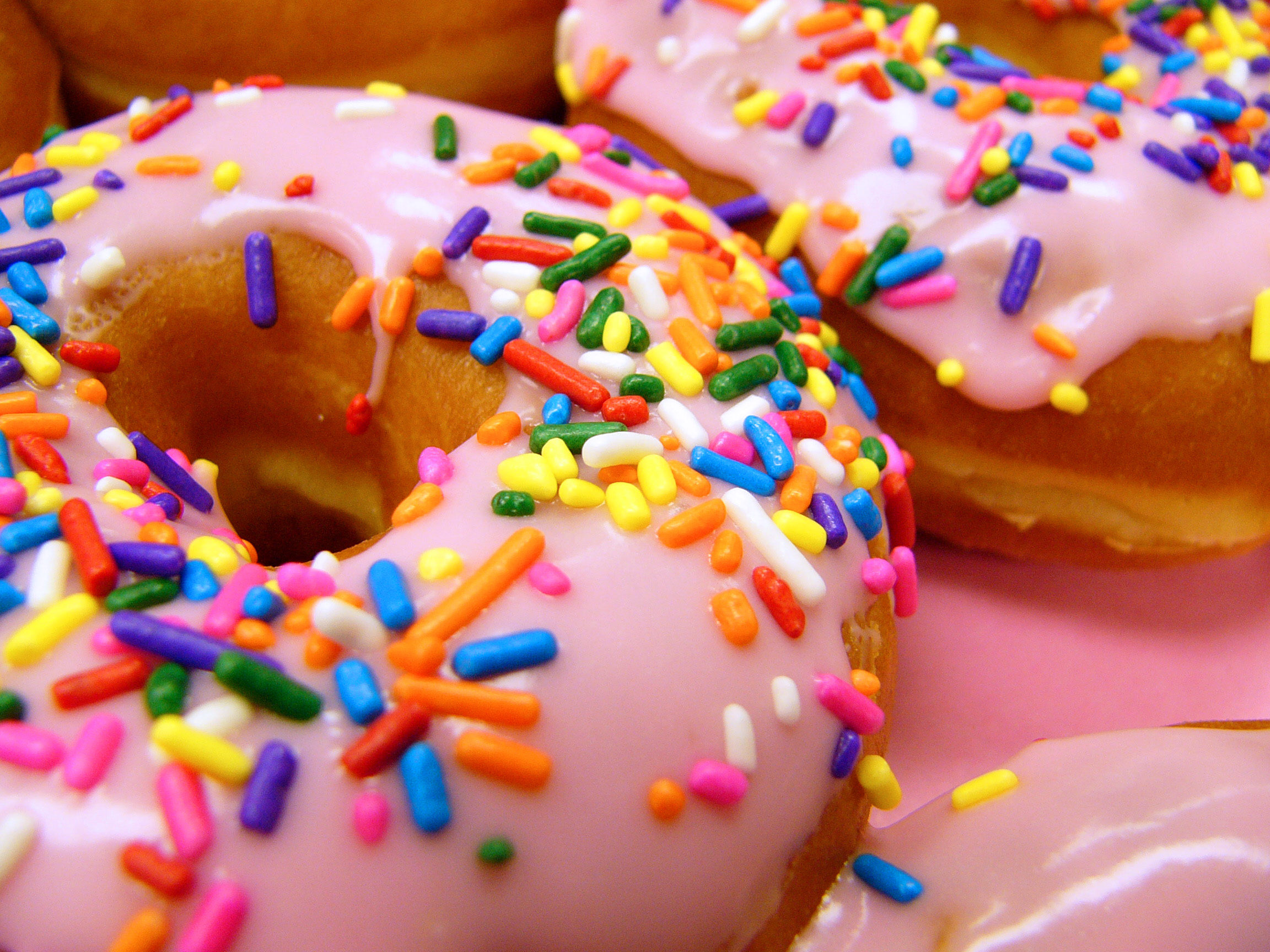 The meme is a humorous image of a donut with a pink frosting and sprinkles, captioned "I can smell the desperation". The image is likely a reference to the idea that the donut is so good it's almost desperate, implying that someone is so attracted to it that they can almost smell its goodness.